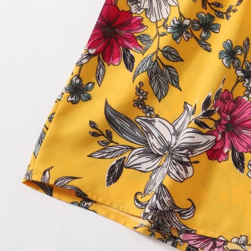 END OF SUMMER CLEARANCE! Plus NEW! Yellow Floral Romper - Picture 3 of 4